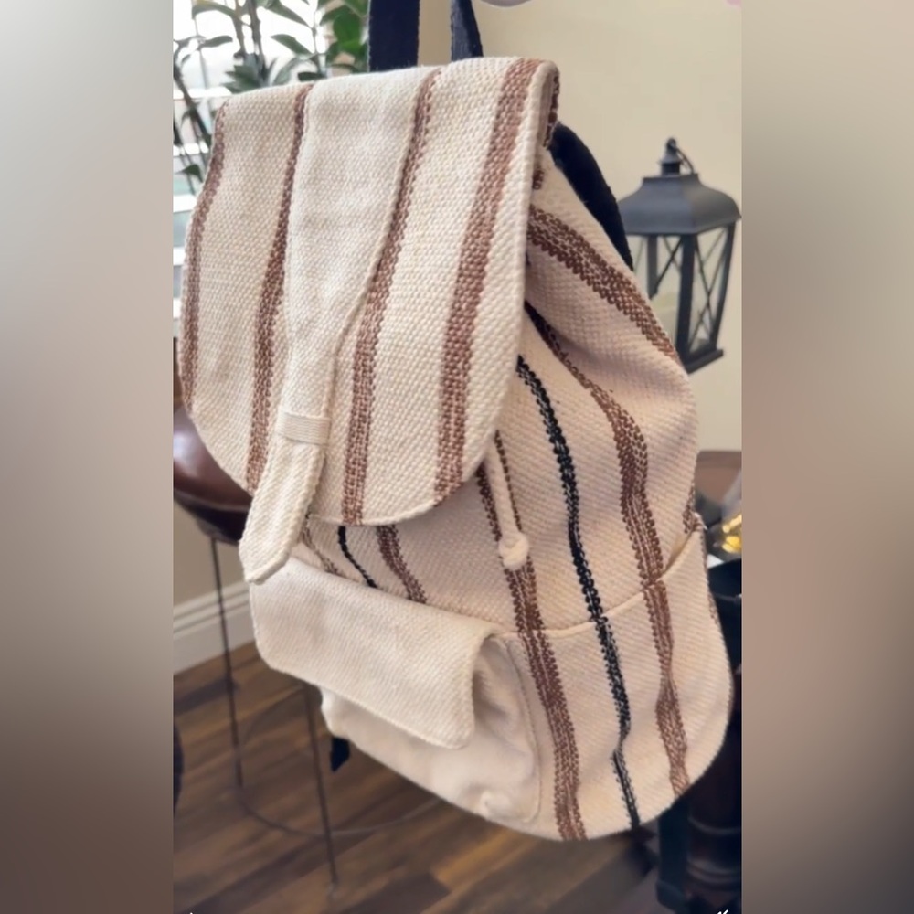 “Universal Tread” Striped Canvas Backpack